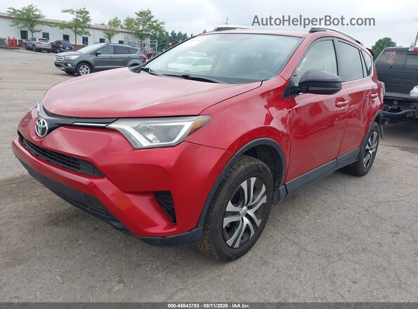 JTMBFREV9GJ073792 2016 TOYOTA RAV4 Red Przód lewy