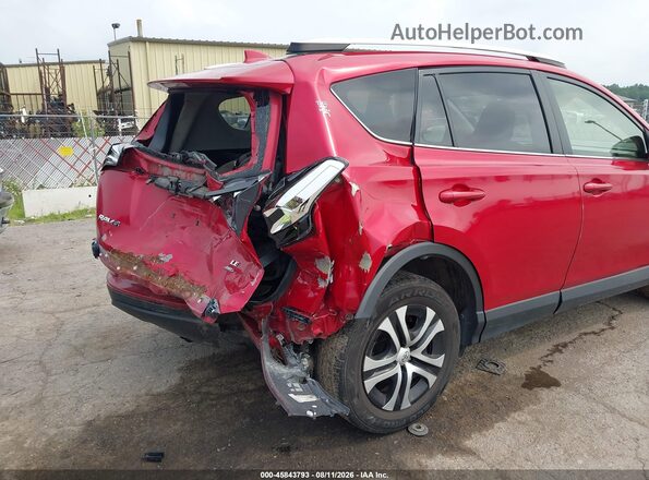JTMBFREV9GJ073792 2016 TOYOTA RAV4 Red Widok z przodu