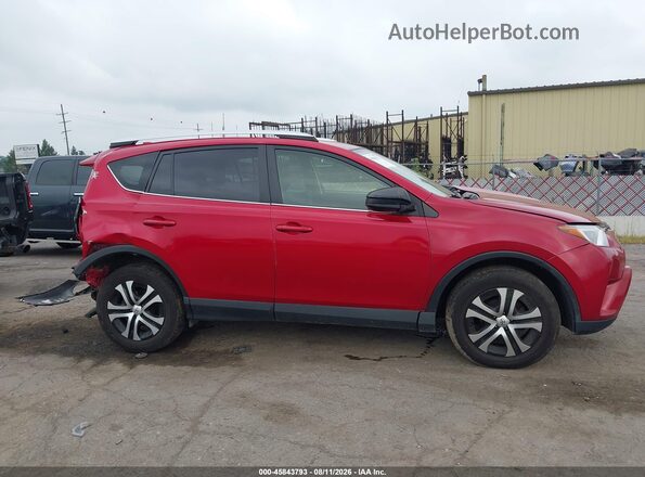 JTMBFREV9GJ073792 2016 TOYOTA RAV4 Red Widok wnętrza z tyłu