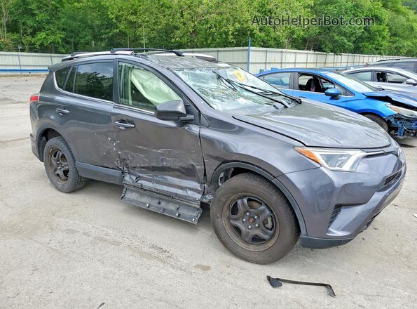 JTMBFREV9GJ102109 2016 TOYOTA RAV4 Gray Delantero derecho