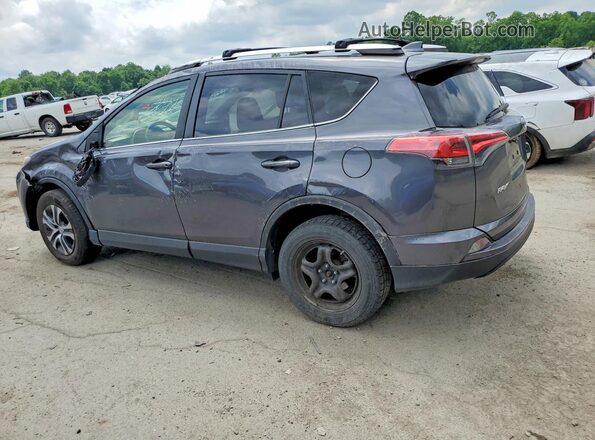 JTMBFREV9GJ102109 2016 TOYOTA RAV4 Gray Trasero izquierdo