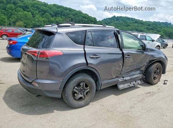 JTMBFREV9GJ102109 2016 TOYOTA RAV4 Gray Trasero derecho