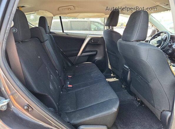 JTMBFREV9HJ715476 2017 TOYOTA RAV4 Серый Вид задней части салона