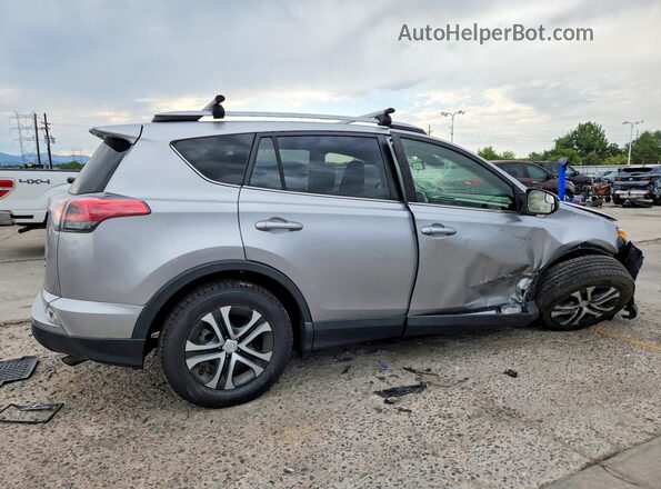 JTMBFREV9JJ257475 2018 TOYOTA RAV4 Silver Trasero derecho