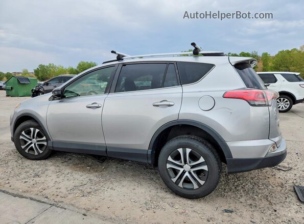 JTMBFREV9JJ257475 2018 TOYOTA RAV4 Silver Trasero izquierdo