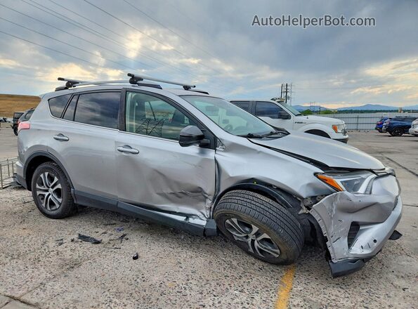 JTMBFREV9JJ257475 2018 TOYOTA RAV4 Silver Delantero derecho