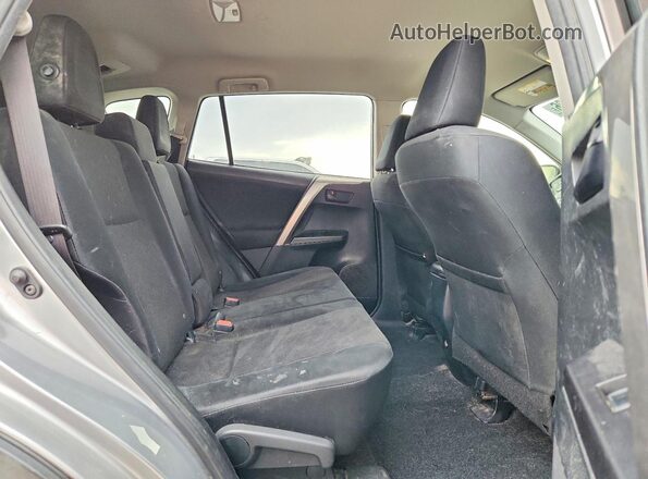 JTMBFREV9JJ257475 2018 TOYOTA RAV4 Silver Vista interior trasera