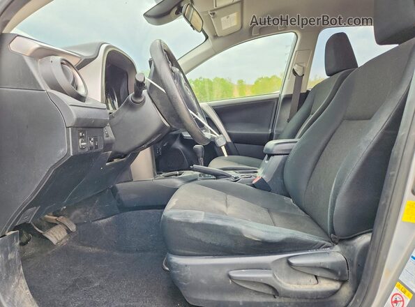 JTMBFREV9JJ257475 2018 TOYOTA RAV4 Silver Vista interior delantera
