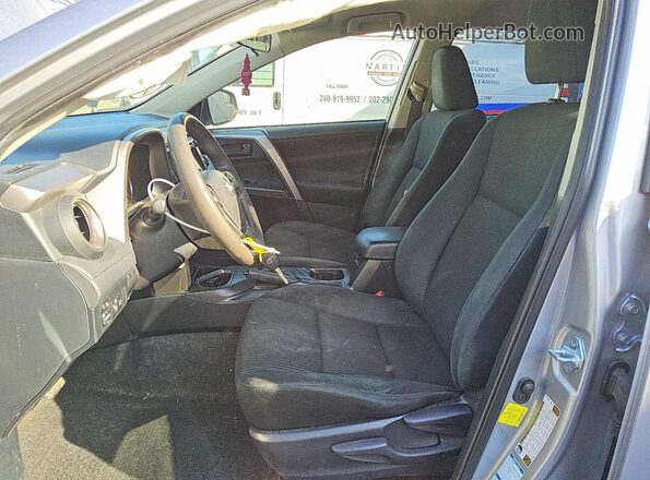 JTMBFREVXJD250713 2018 TOYOTA RAV4 Silver წინა სალონის ხედი