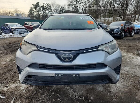 JTMBFREVXJD250713 2018 TOYOTA RAV4 Silver VIN კოდის სტიკერის ხედი