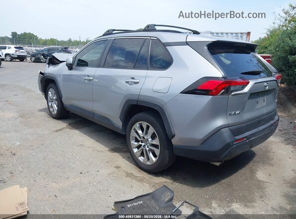 JTMC1RFV2KD021333 2019 TOYOTA RAV4 Серебряный Задняя левая четверть