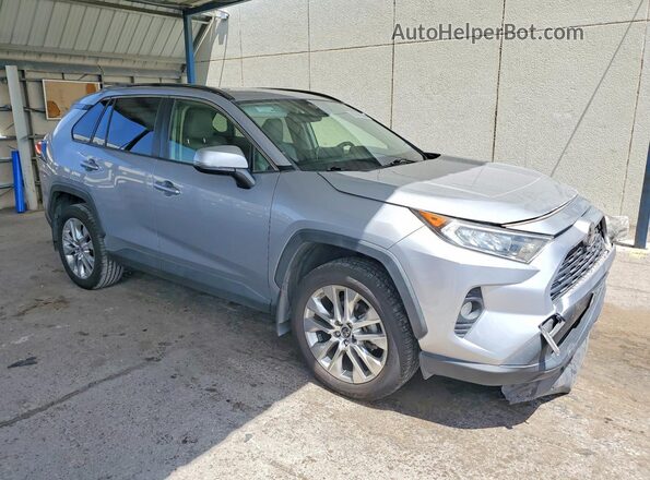 JTMC1RFV4KD030339 2019 TOYOTA RAV4 Gray Delantero derecho