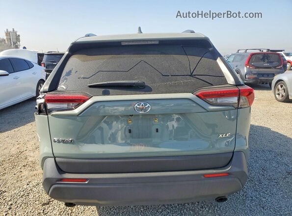 JTMC1RFV5PD106156 2023 TOYOTA RAV4 Gray Rear view