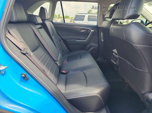 JTMC1RFV8KD503143 2019 TOYOTA RAV4 Blue Rear interior view