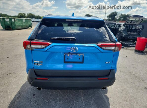 JTMC1RFV8KD503143 2019 TOYOTA RAV4 Blue Rear view