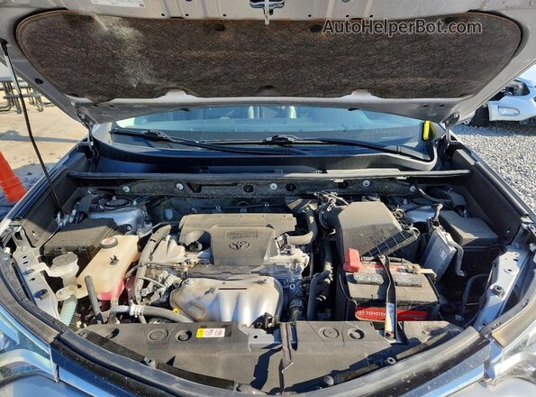 JTMDFREV0JJ214362 2018 TOYOTA RAV4 Silver Engine compartment view