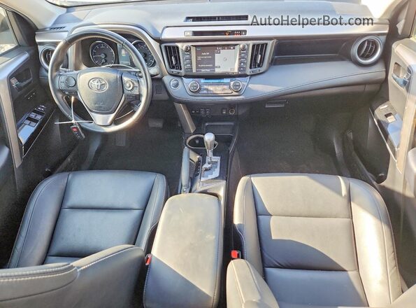 JTMDFREV0JJ214362 2018 TOYOTA RAV4 Silver Dashboard view