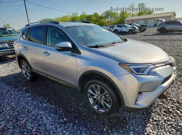 JTMDFREV0JJ214362 2018 TOYOTA RAV4 Silver Front right