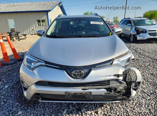 JTMDFREV0JJ214362 2018 TOYOTA RAV4 Silver Front view