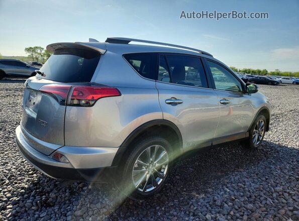 JTMDFREV0JJ214362 2018 TOYOTA RAV4 Silver Rear right