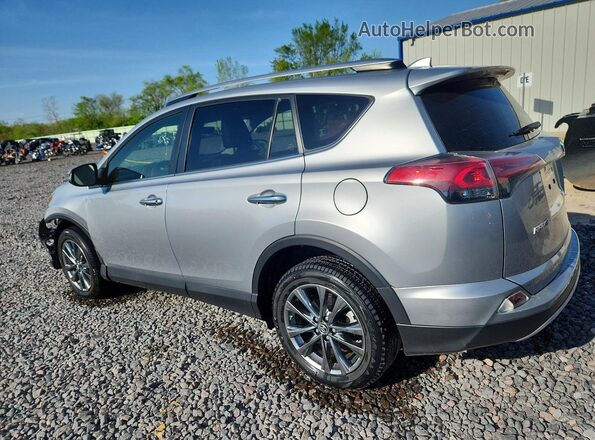 JTMDFREV0JJ214362 2018 TOYOTA RAV4 Silver Rear left