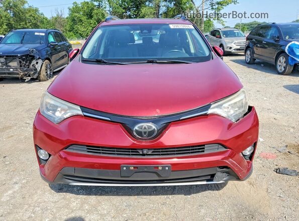 JTMDFREV2JD233655 2018 TOYOTA RAV4 Red Front view