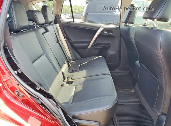 JTMDFREV2JD233655 2018 TOYOTA RAV4 Red Rear interior view