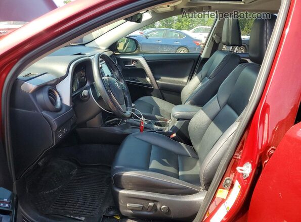 JTMDFREV2JD233655 2018 TOYOTA RAV4 Red Front interior view