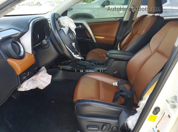 JTMDFREV2JJ231406 2018 TOYOTA RAV4 White Vista interior delantera