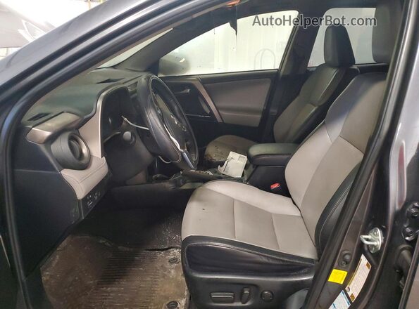 JTMDFREV3JJ258100 2018 TOYOTA RAV4 Gray წინა სალონის ხედი