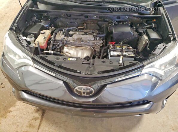 JTMDFREV3JJ258100 2018 TOYOTA RAV4 Gray უკანა სალონის ხედი