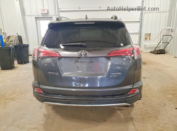 JTMDFREV3JJ258100 2018 TOYOTA RAV4 Gray უკანა ხედი