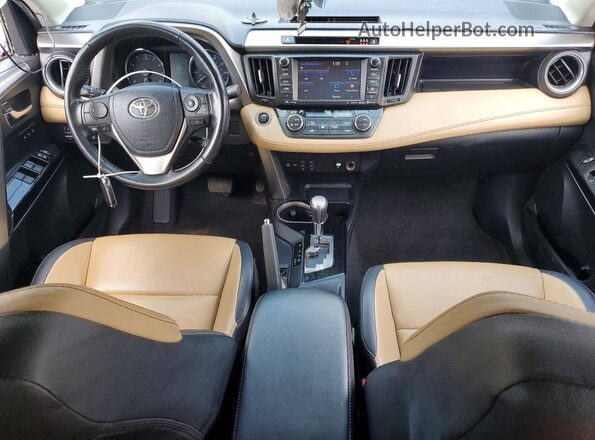 JTMDFREV4HJ171073 2017 TOYOTA RAV4 Red Widok deski rozdzielczej