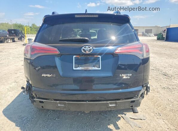JTMDFREV4HJ704121 2017 TOYOTA RAV4 Blue Rear view