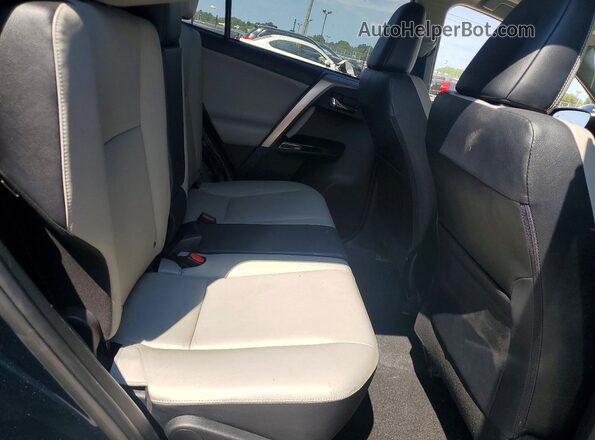 JTMDFREV4HJ704121 2017 TOYOTA RAV4 Blue Rear interior view