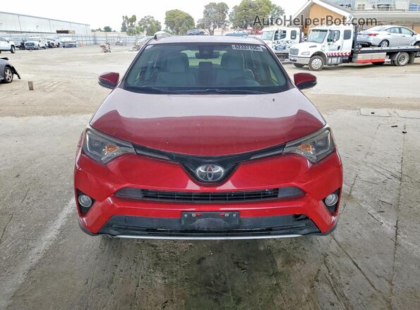 JTMDFREV7GJ078529 2016 TOYOTA RAV4 Burgundy Front view