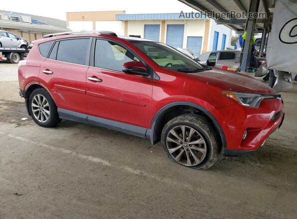 JTMDFREV7GJ078529 2016 TOYOTA RAV4 Burgundy Front right