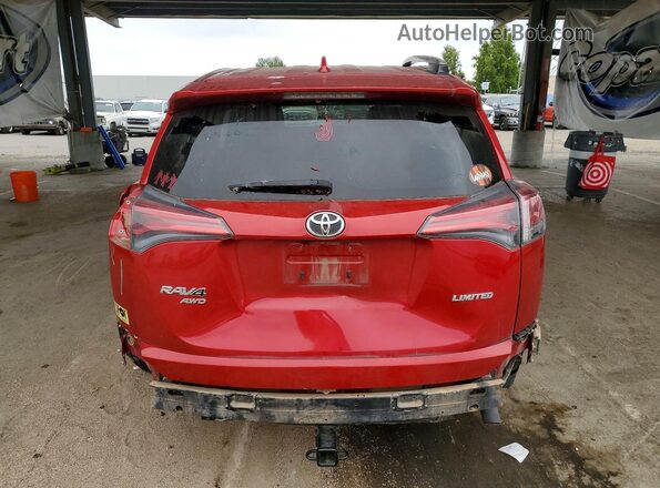 JTMDFREV7GJ078529 2016 TOYOTA RAV4 Burgundy Rear view