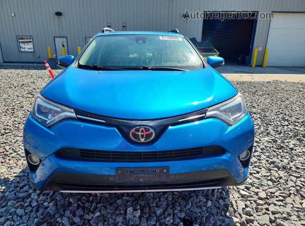 JTMDFREV8JJ207675 2018 TOYOTA RAV4 Blue წინა ხედი