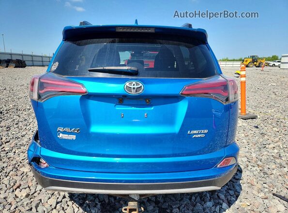JTMDFREV8JJ207675 2018 TOYOTA RAV4 Blue უკანა ხედი