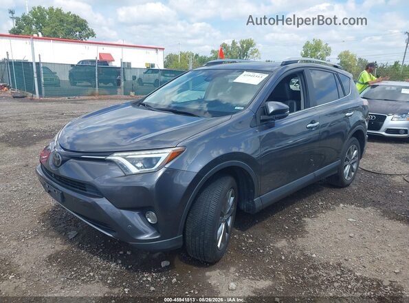 JTMDFREV8JJ722806 2018 TOYOTA RAV4 Gray Front left