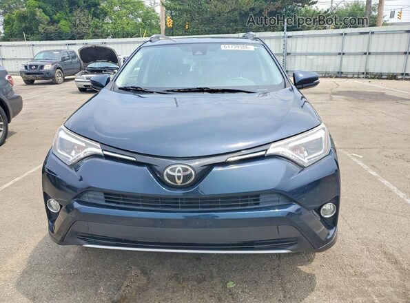 JTMDFREVXJD246234 2018 TOYOTA RAV4 Teal Widok z przodu