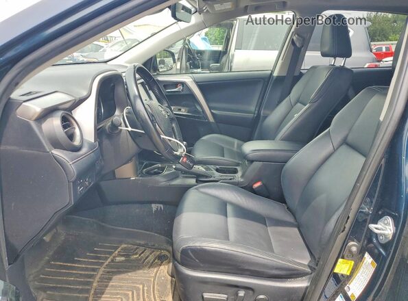 JTMDFREVXJD246234 2018 TOYOTA RAV4 Teal Widok wnętrza z przodu