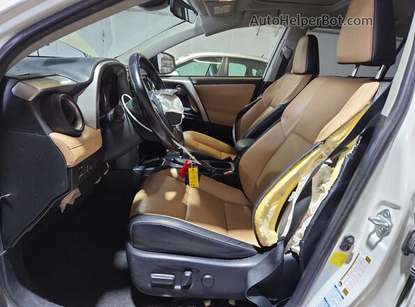 JTMDJREV0GD032103 2016 TOYOTA RAV4 White Front interior view