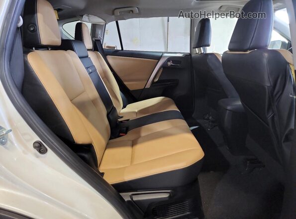 JTMDJREV0GD032103 2016 TOYOTA RAV4 White Rear seats view