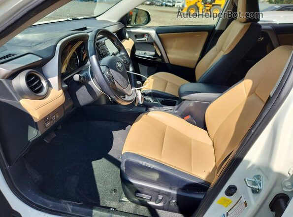 JTMDJREV1GD003452 2016 TOYOTA RAV4 White Widok wnętrza z przodu