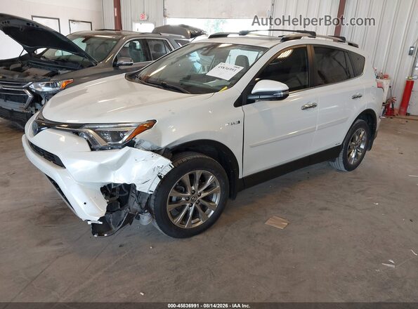 JTMDJREV1GD044504 2016 TOYOTA RAV4 HYBRID White Vista tres cuartos delantera izquierda