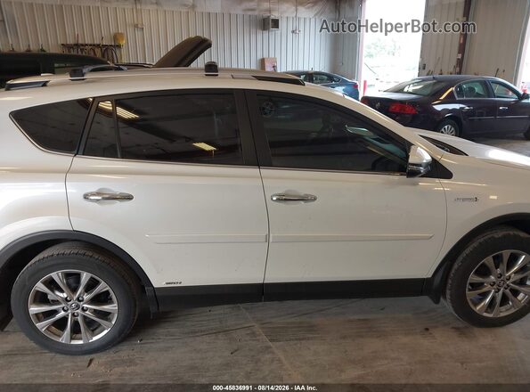 JTMDJREV1GD044504 2016 TOYOTA RAV4 HYBRID White Vista interior trasera