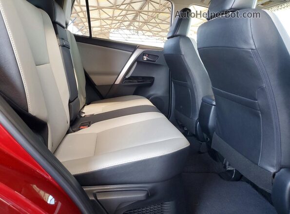 JTMDJREV2JD219723 2018 TOYOTA RAV4 Red Հետևի նստատեղերի տեսք