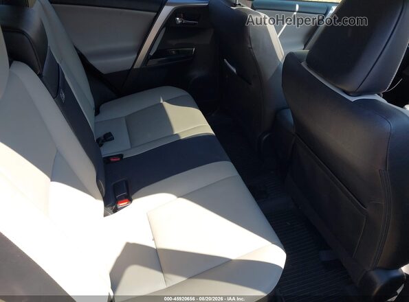 JTMDJREV6GD013040 2016 TOYOTA RAV4 HYBRID Gray Вид наклейки з VIN-кодом